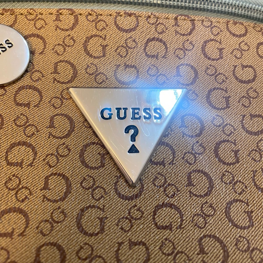 Guess make up bag handle blue trim